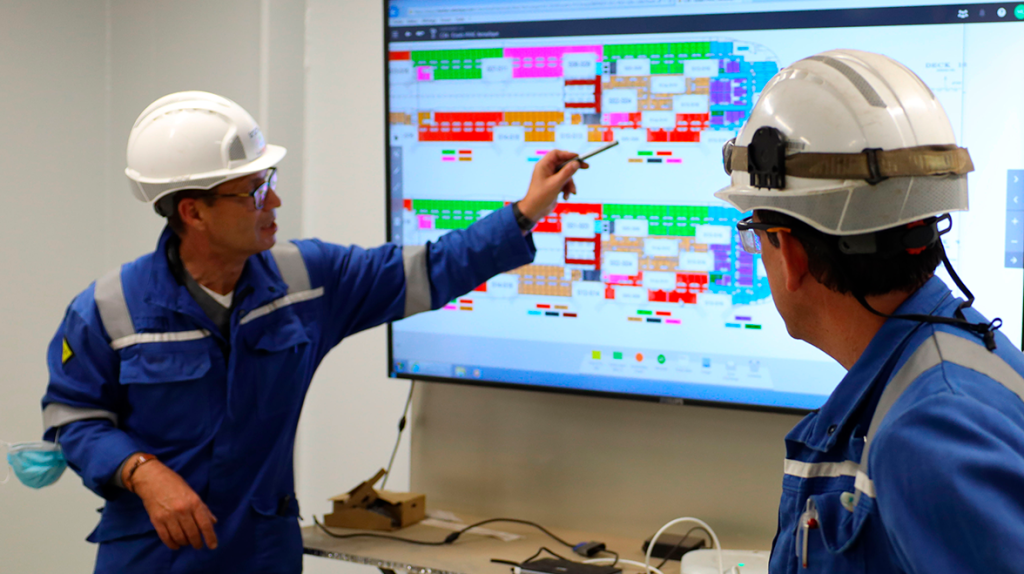 A team practicing lean rituals on an iObeya screen during the construction of a cruise ship.